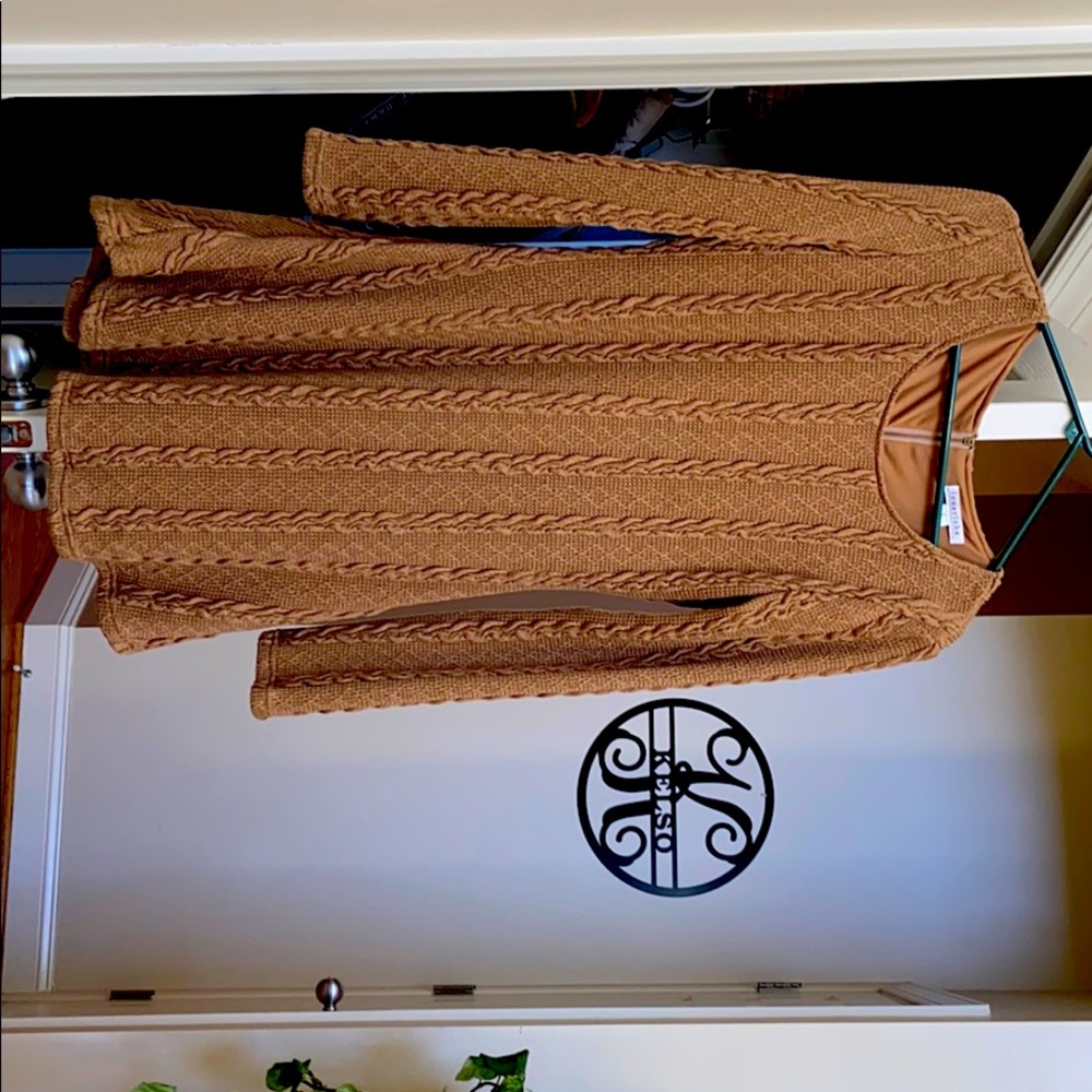 Super soft poly/cotton blend sweater dress.